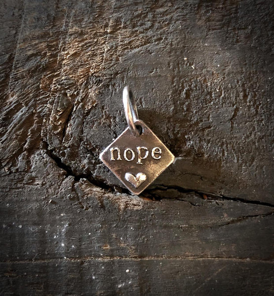 Nope Bas Relief Pendant